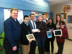 MLA Moe Amery presenting CIP Grant cheque to Phoenix.